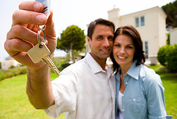 Couple with house key